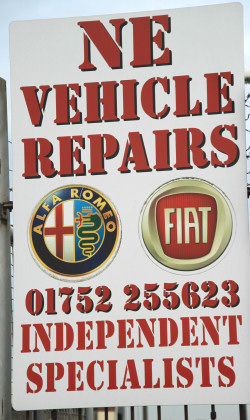 NE Vehicle repairs sign